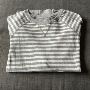 Gray and white & solid gray Lululemon reversible sweater.